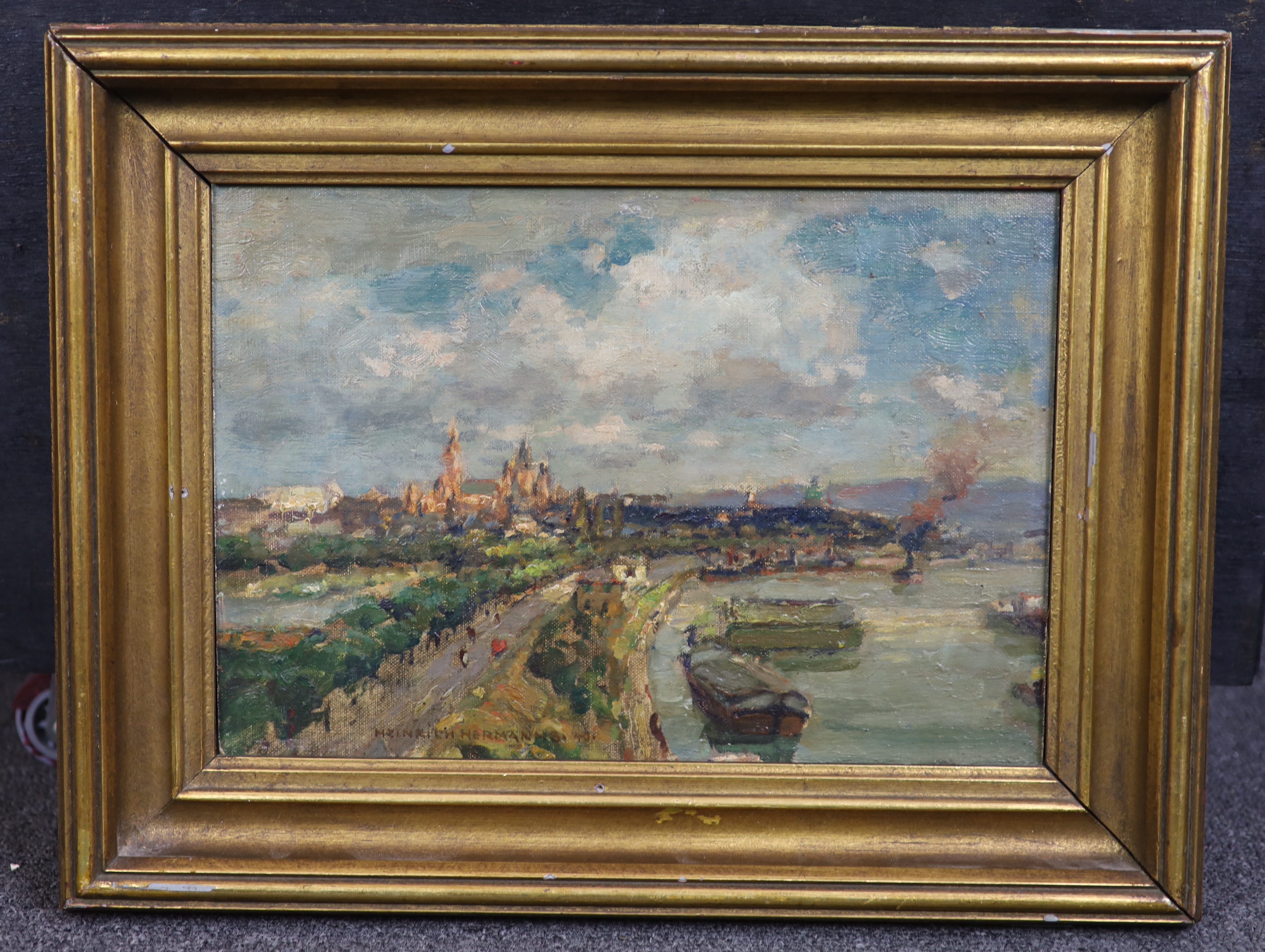 Heinrich Hermanns (German, 1862-1942), oil on canvas board, City view, signed, 22 x 32cm